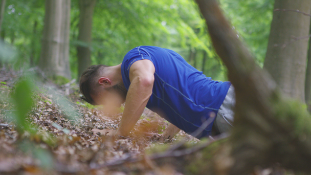 man working out in the woods - Footage, Video
