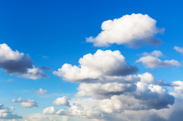 large white cumulus clouds in blue sky in spring - Photo, Image
