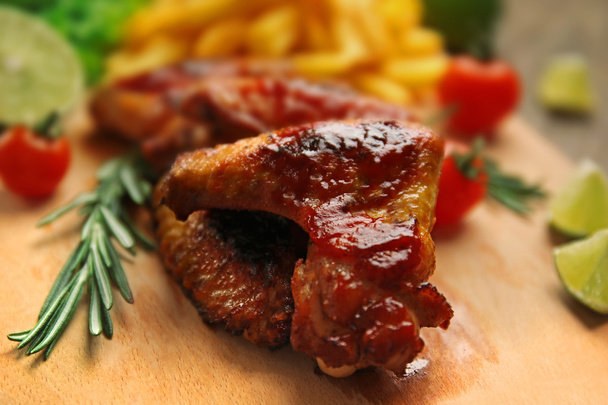 Grilled chicken wings with French fries - Φωτογραφία, εικόνα