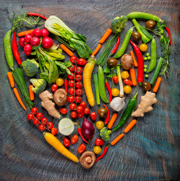 Collection of fresh vegetables in heart shape - Фото, изображение