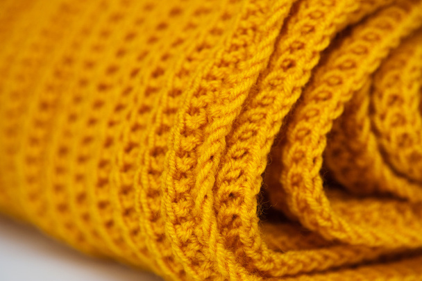 fabric orange knitted texture background with scarf clothing - Fotó, kép