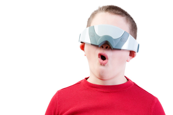 Impressed boy in virtual reality glasses - Foto, Imagen