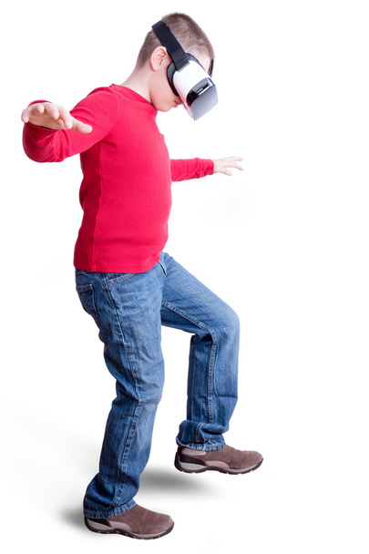 Boy in red shirt with virtual reality glasses - Foto, imagen