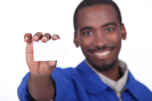 Worker showing business card - Foto, Imagem