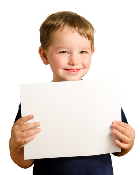Cute young happy preschooler boy holding up blank sign with room for copy isolated on white - Foto, immagini