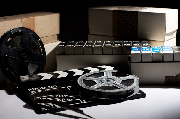 Reel with film and cinema clap - Photo, Image