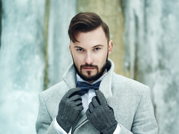 Outdoor portrait of handsome man in gray coat - Fotografie, Obrázek