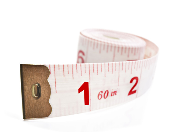 White and red tape measure on a white background - Photo, Image
