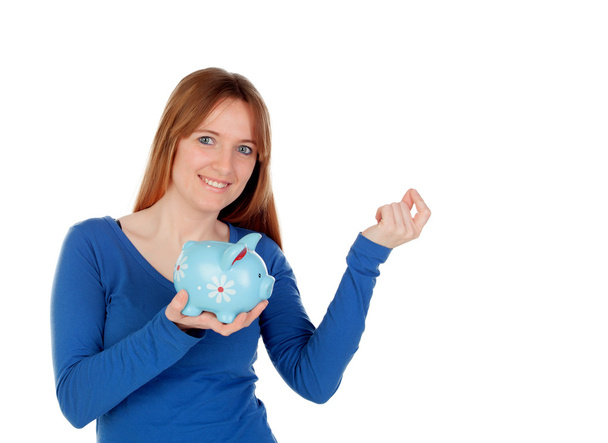 young woman with a blue money box  - Zdjęcie, obraz