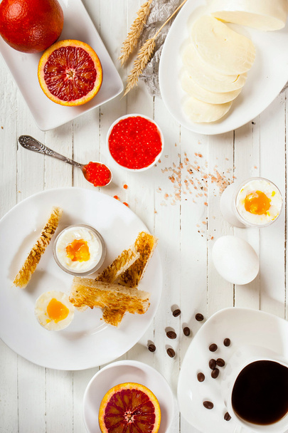 Breakfast with eggs and coffee on a white background. - Fotografie, Obrázek