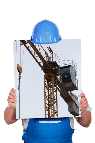 Man showing photo of a crane - Photo, Image