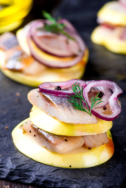 Appetizer canape with herring, apples  - Foto, Imagen
