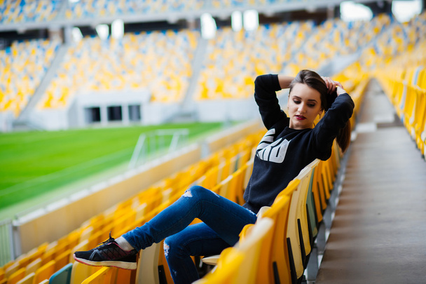 Happy young woman on stadium, sport girl , fitness lady at summer , smiling girl on city street, health lifestyle concept, soft focus, series. - Zdjęcie, obraz