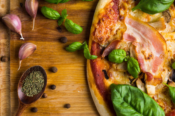 Fresh pizza with meat and basil - Photo, image
