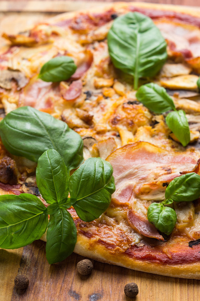 Fresh pizza with meat and basil - Photo, Image