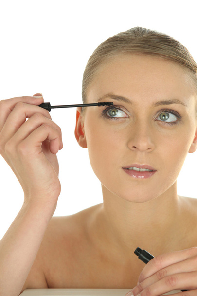 Woman applying makeup - Photo, Image