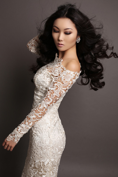 sensual asian woman with long dark hair in elegant lace dress  - Φωτογραφία, εικόνα