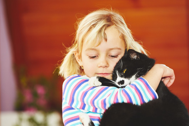 Girl with her cat - Photo, Image
