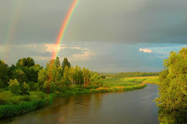 Rainbow above the river - Фото, зображення