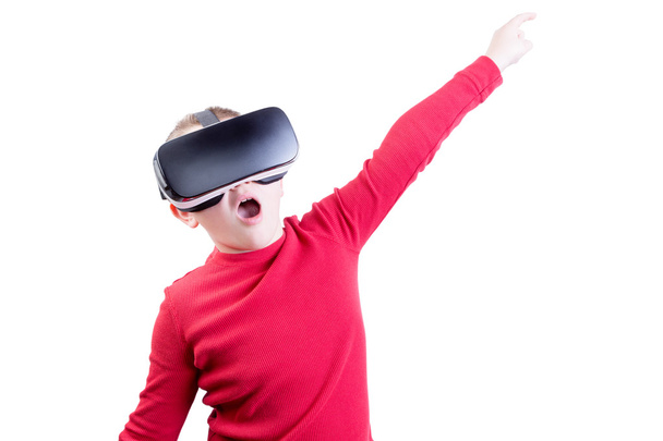 Child flying with virtual reality headset on - 写真・画像