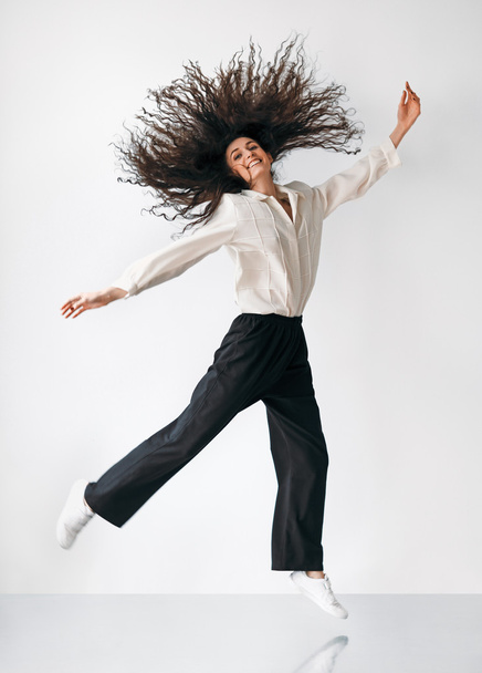 Happy freedom jumping girl - Foto, Imagen