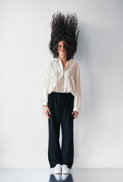 fashion woman with flying hair up - Zdjęcie, obraz