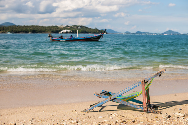 Beach lounge chair on sandy beach - Photo, Image