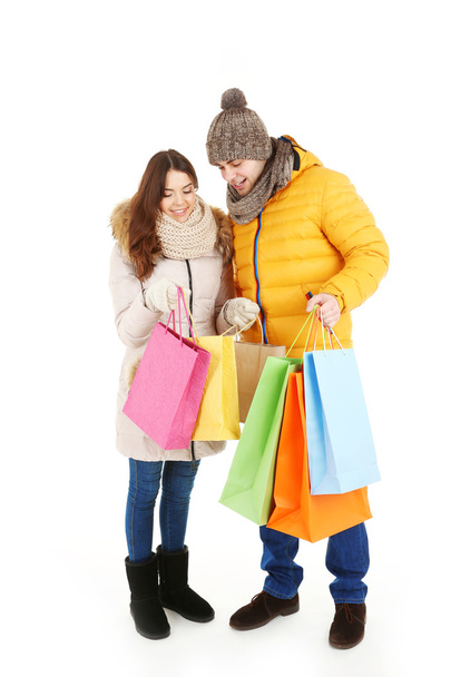 couple with colorful shopping bags - Fotó, kép