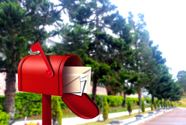 Красный почтовый ящик на пешеходной дорожке
 - Фото, изображение