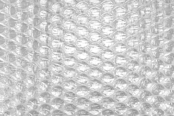 Embalaje de envoltura de burbuja blanca o película de amortiguador de aire Fondo abstracto
 - Foto, imagen