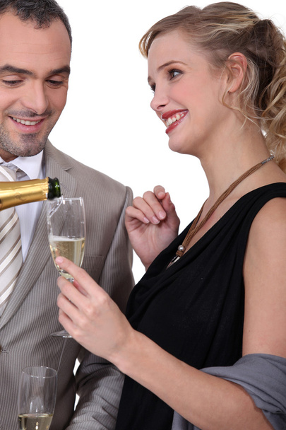 Couple drinking champagne - Фото, зображення