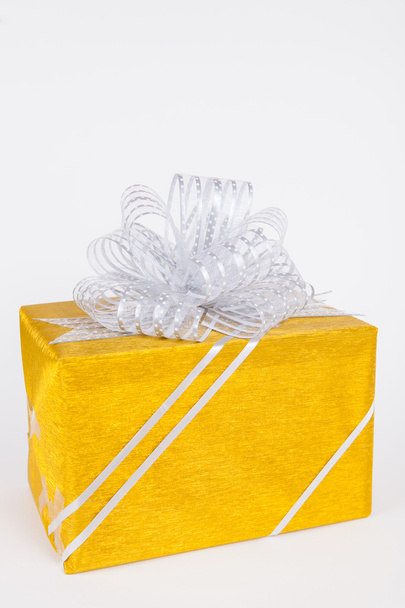 Gift boxes with golden ribbon bow - Foto, Bild