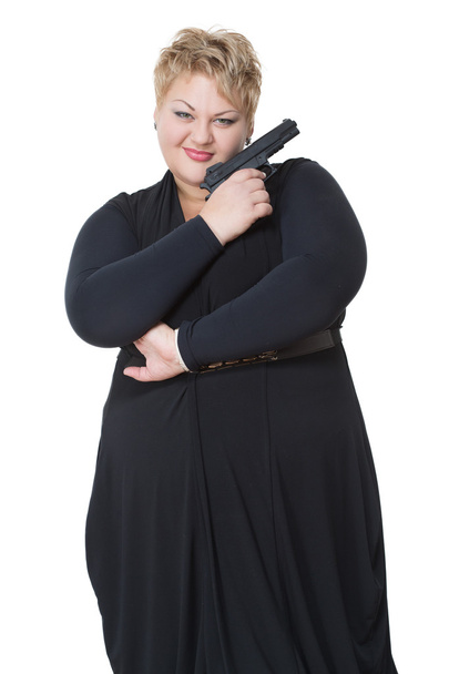 fat woman with a gun. - Fotoğraf, Görsel