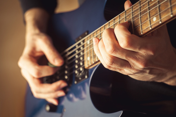 Men playing guitar close-up shot - Фото, изображение