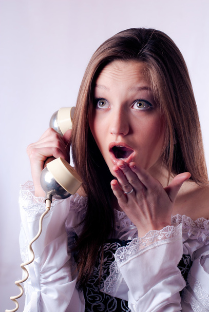 Beautiful girl talking on the phone - Fotografie, Obrázek