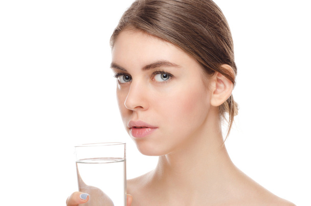 portrait of attractive  woman isolated on white studio shot with glass of water - Φωτογραφία, εικόνα