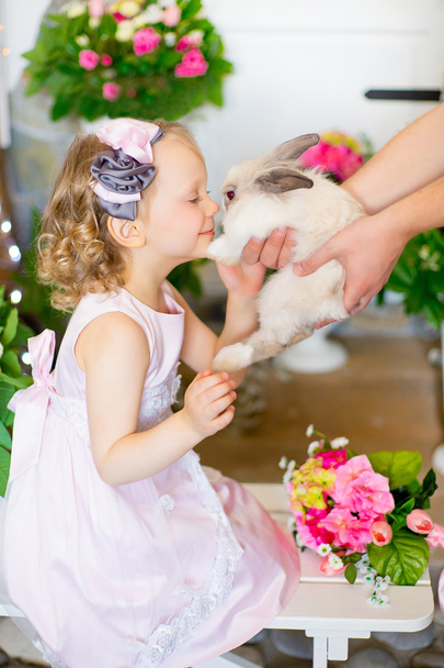 little girl with a rabbit - Фото, зображення