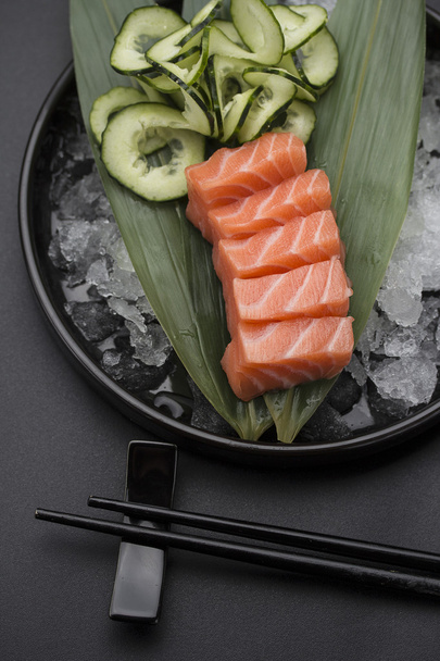 Japanese cuisine. Sushi with fresh ingredients. - Fotó, kép