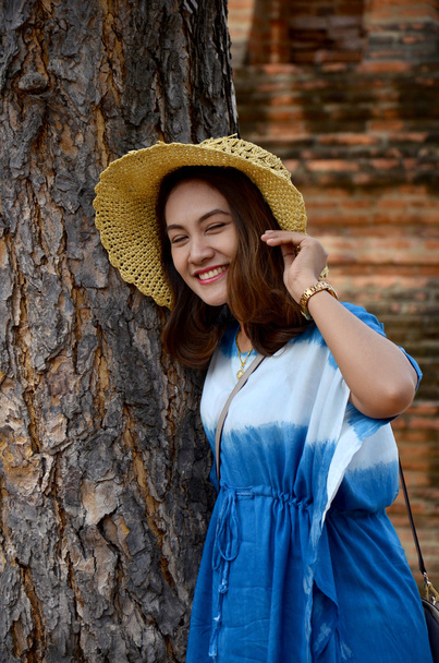 Thai women portrait with tree at ancient building - Photo, Image