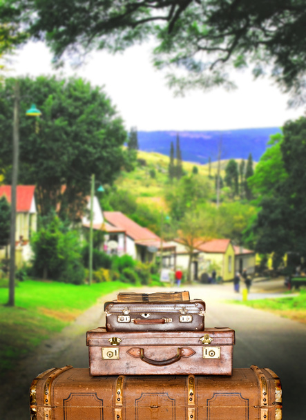 Traveling suitcases in a small town street - Foto, Imagem