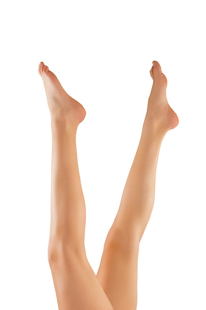 Beautiful wet feet, women legs isolated on white background - Zdjęcie, obraz