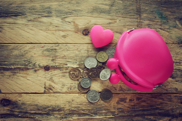 pink silicone purse with coins and heart - Foto, immagini