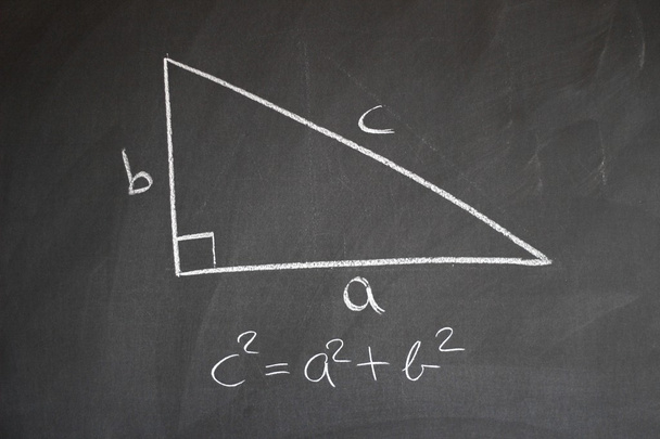 Studying mathematics on a blackboard - Photo, Image