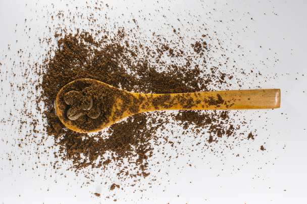 Coffee and wooden spoon - Фото, зображення