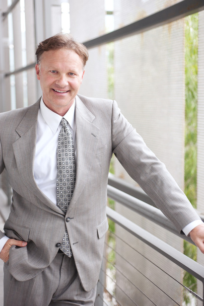 Portrait of a confident mature businessman standing outside - Zdjęcie, obraz
