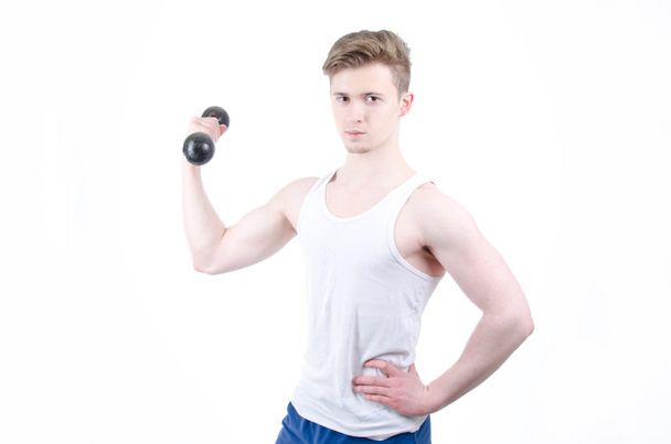 A man in a new fitness club. White background. - Foto, imagen