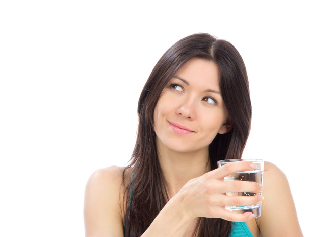 Woman drinking water from clear glass - Foto, Imagen