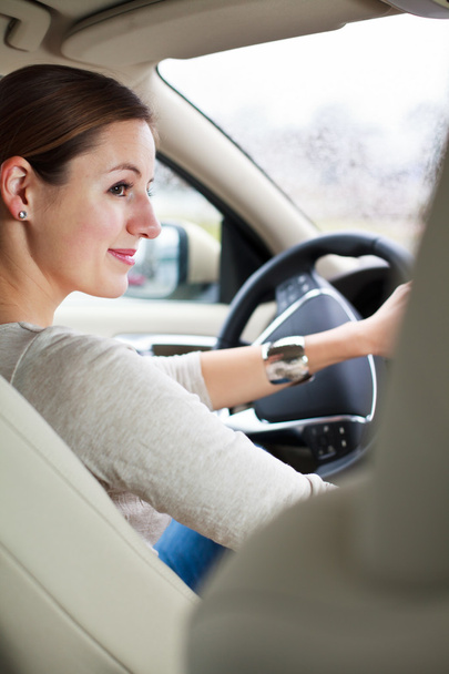 Woman driving a car - Foto, Imagen