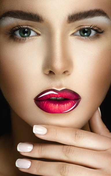 Beautiful young model with bright make-up and manicure - 写真・画像