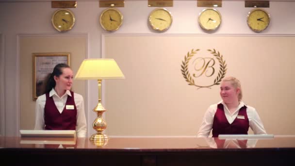 Receptionists work in Bogorodino hotel. - Filmmaterial, Video